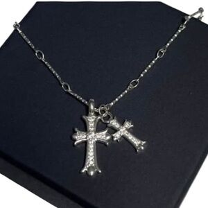 Double cross necklace. Silver tone. Chain.